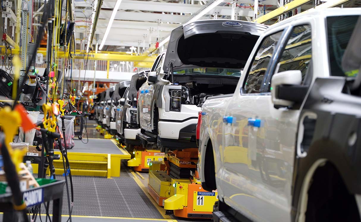 Trucks on an assembly line