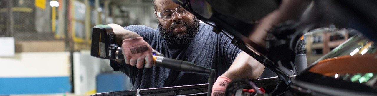 A man working on an assembly line