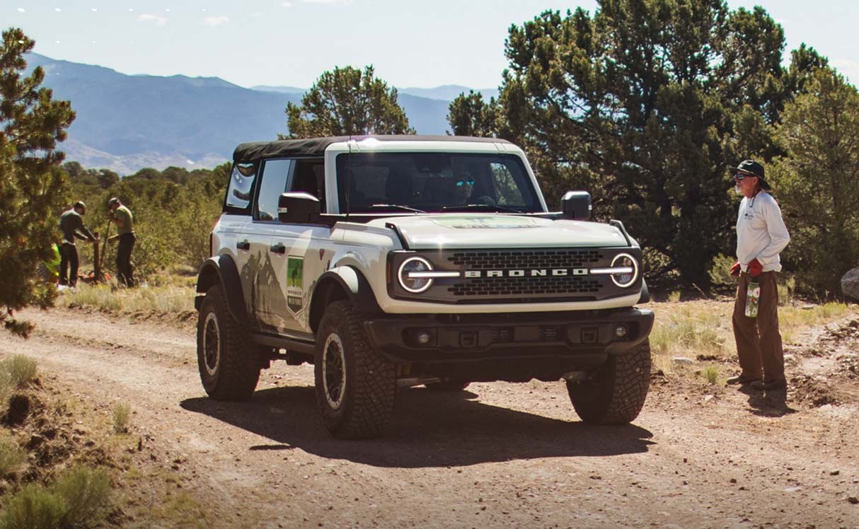A Ford Bronco on a gravel road